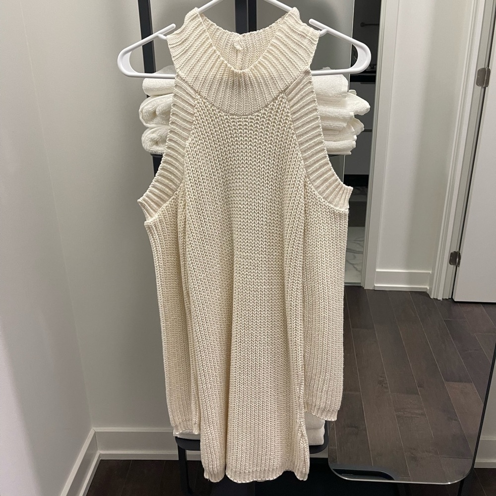 White knit sweater dress with shoulder detail